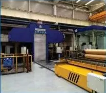 Foil mill with roll transport carriage