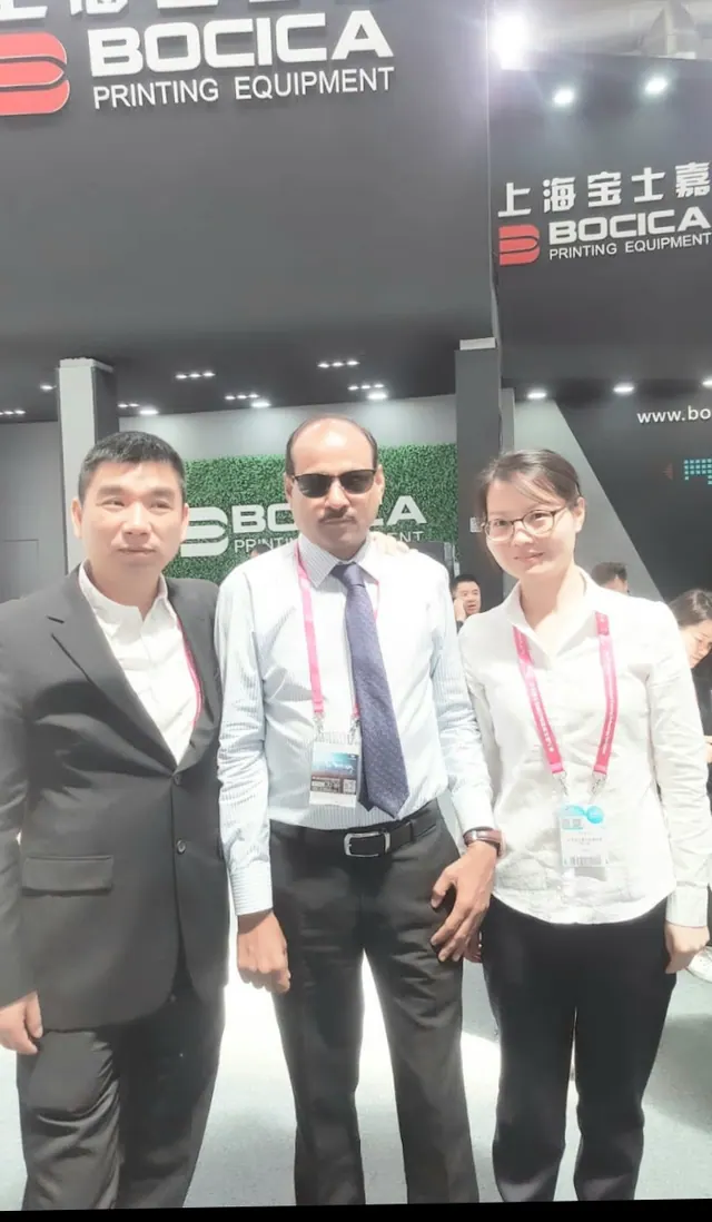 Visiting a printing equipment manufacturer's booth