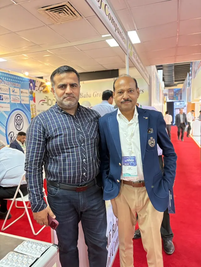 Meeting industry contacts in the exhibition aisle